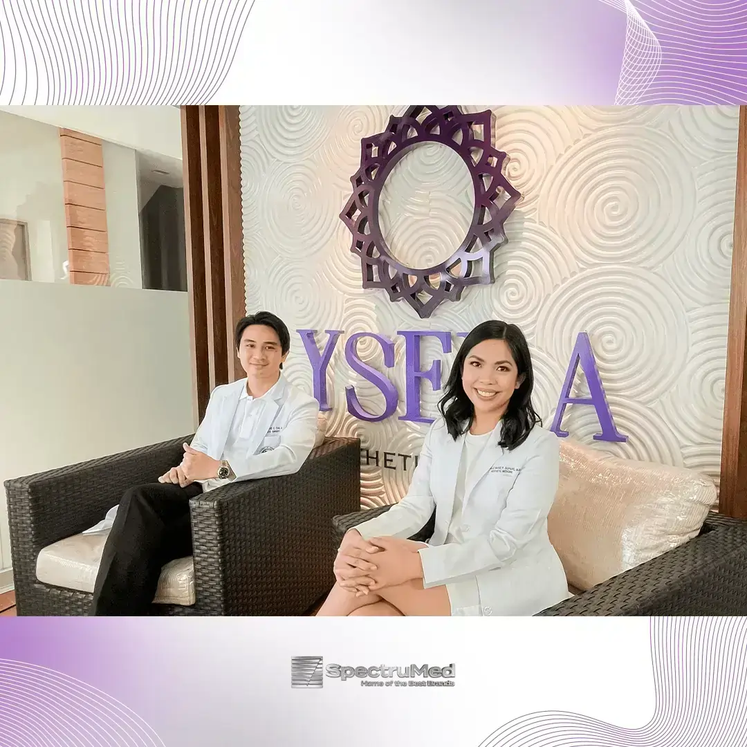 WhiteLase Clinic Spotlight: Ysera Aesthetic Center Dr. Terbio and her colleague smiles at the camera and poses behind Ysera Aesthetic Center sign